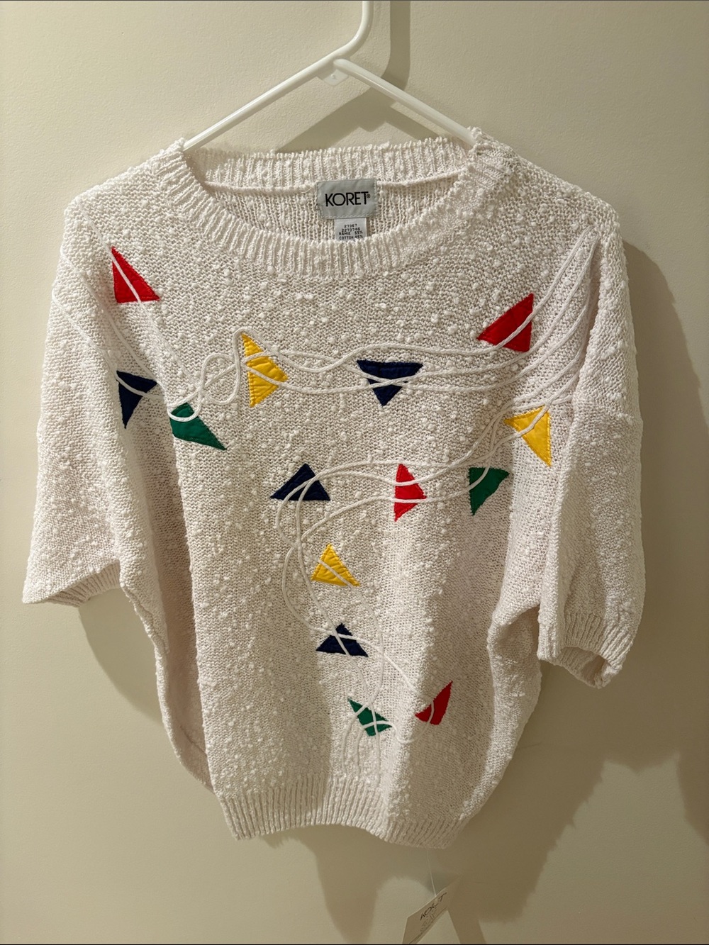 Koret Cream Knit Crewneck Sweater with Red, Yellow, Green & Blue Pennants